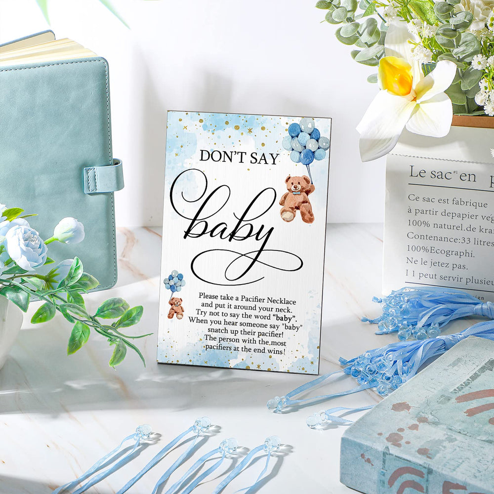 Wesiti baby shower table decor for a warm ambiance.