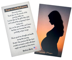 Westmon Works pregnant-woman silhouette on token representing motherhood journey and blessing