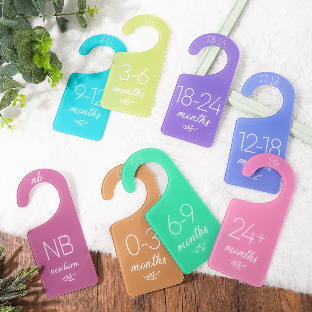 Whaline acrylic baby closet divider pastel set for orderly age-group sorting.
