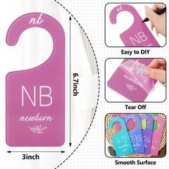 Whaline pastel divider helps separate newborn and toddler outfits cleanly.