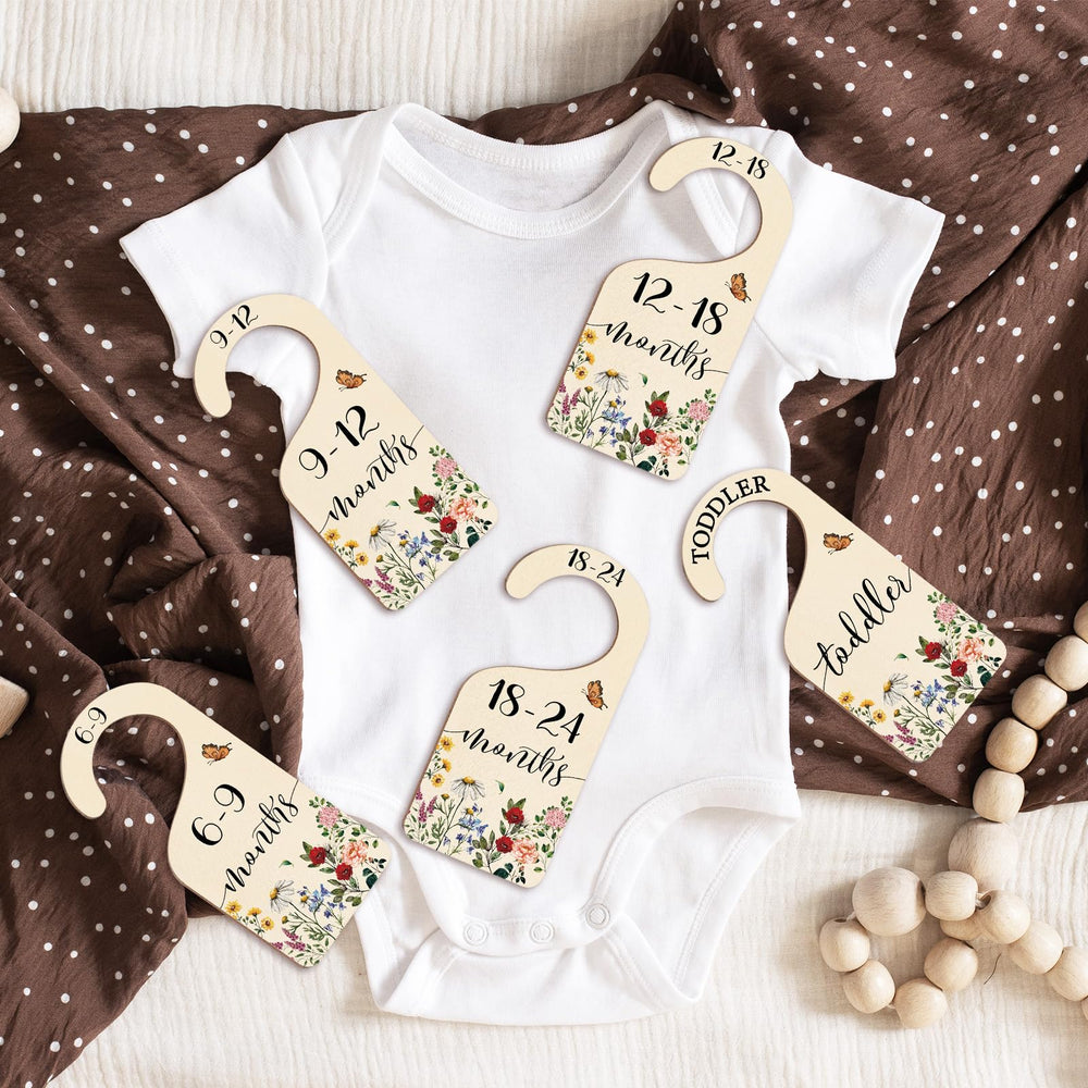 Whaline baby growth keepsake dividers offer a memory piece for the nursery