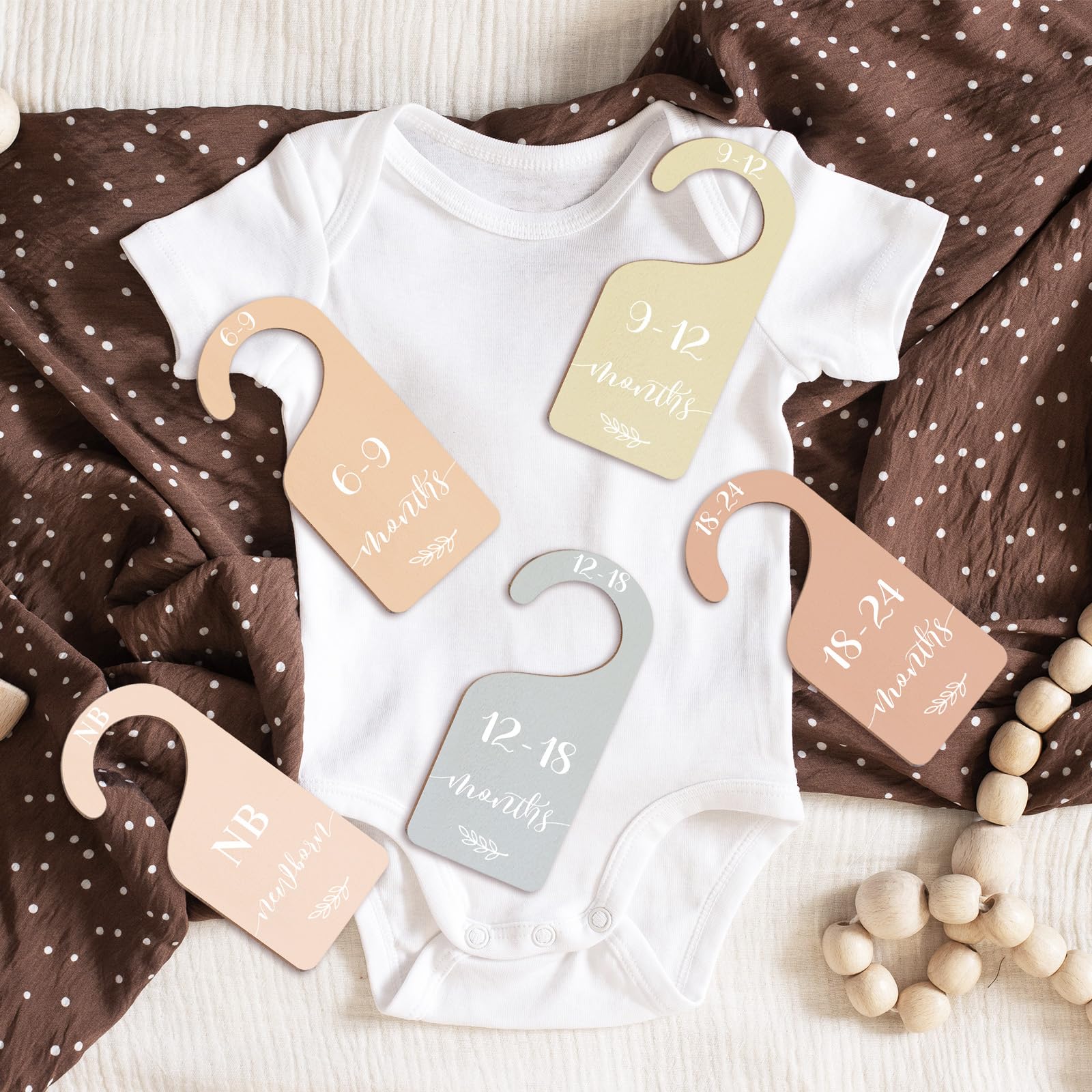 Whaline keepsake potential: growth dividers document baby milestones.
