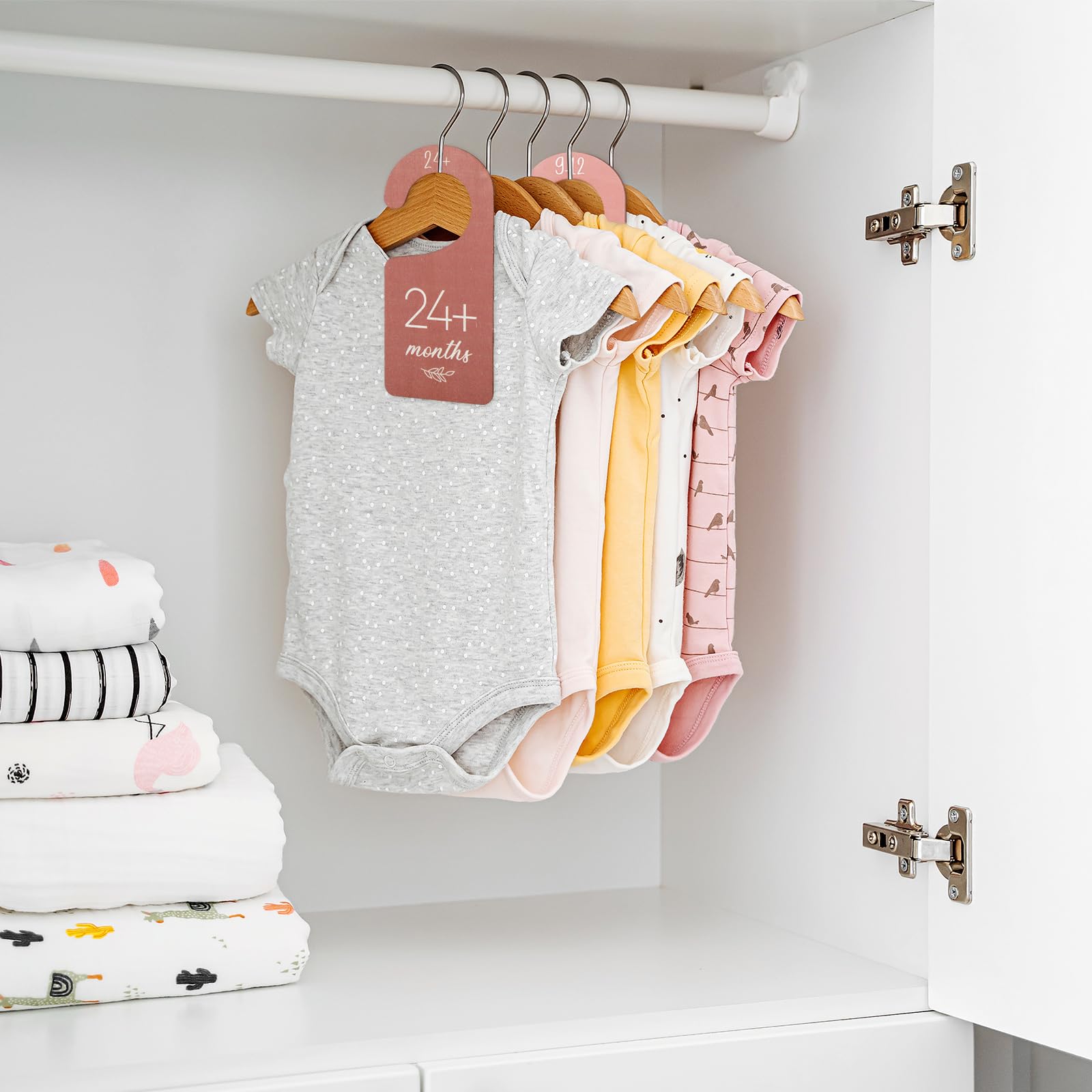 Whaline newborn-to-toddler organizer fits most closets for growth tracking.