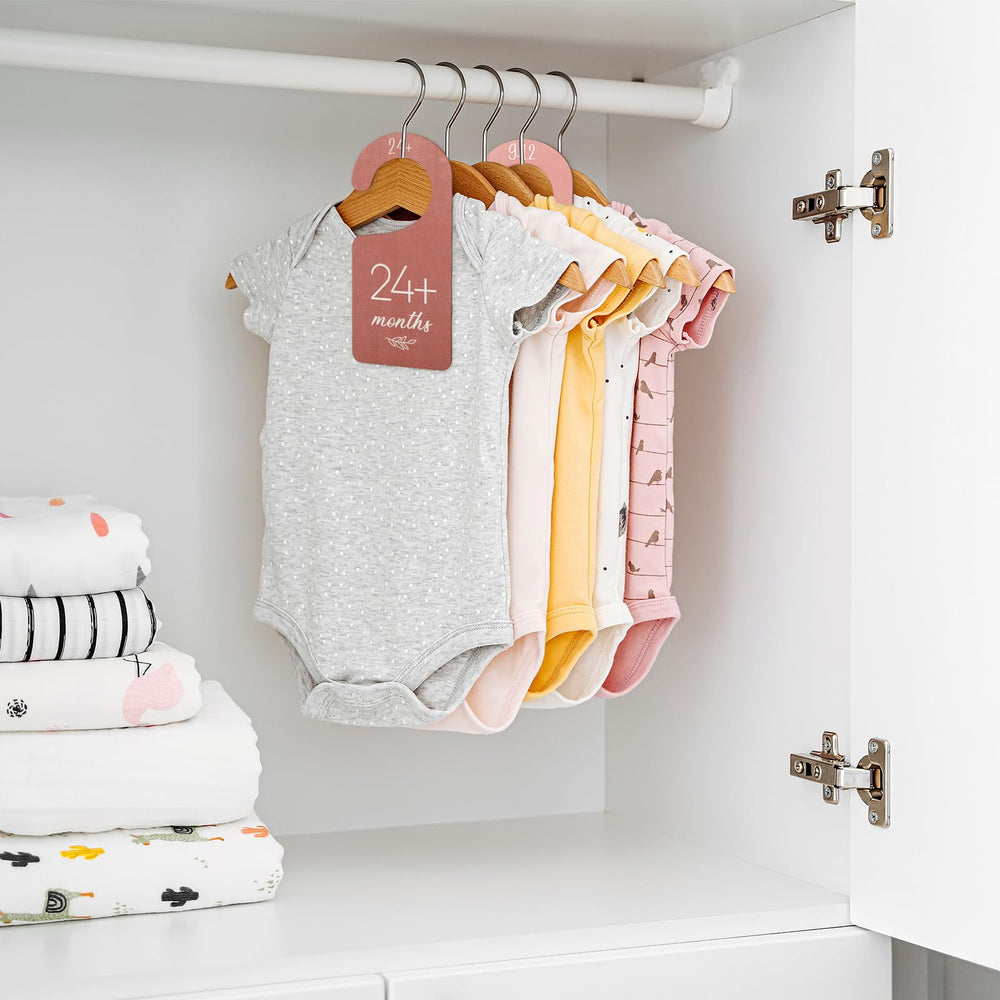 Whaline newborn-to-toddler organizer fits most closets for growth tracking.