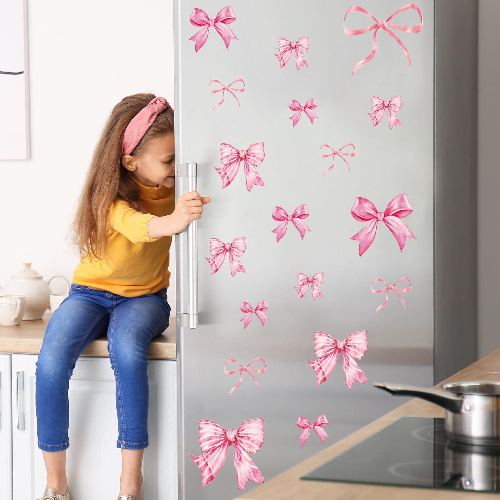 Whaline nursery bow wall decor brightens kids room with charm.