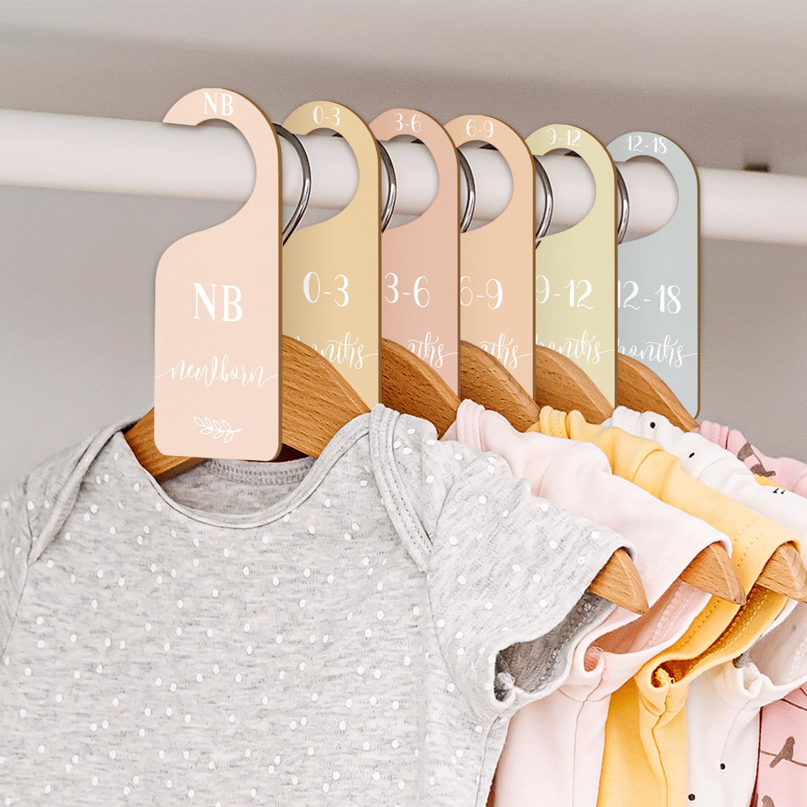 Whaline nursery organization idea image showcases efficient wardrobe sorting.