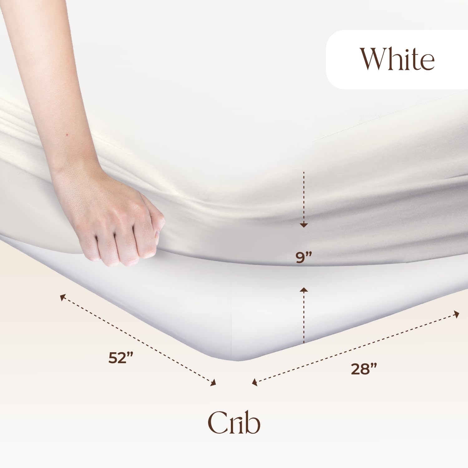 Whisper Organics waterproof crib pad close-up highlights the PU barrier for spills