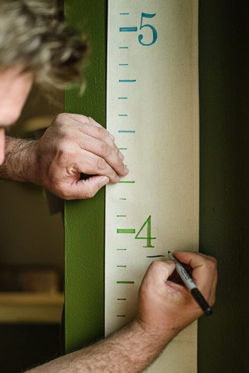 White Loft growth chart features baseboard-friendly design starting at 6-inches for accuracy