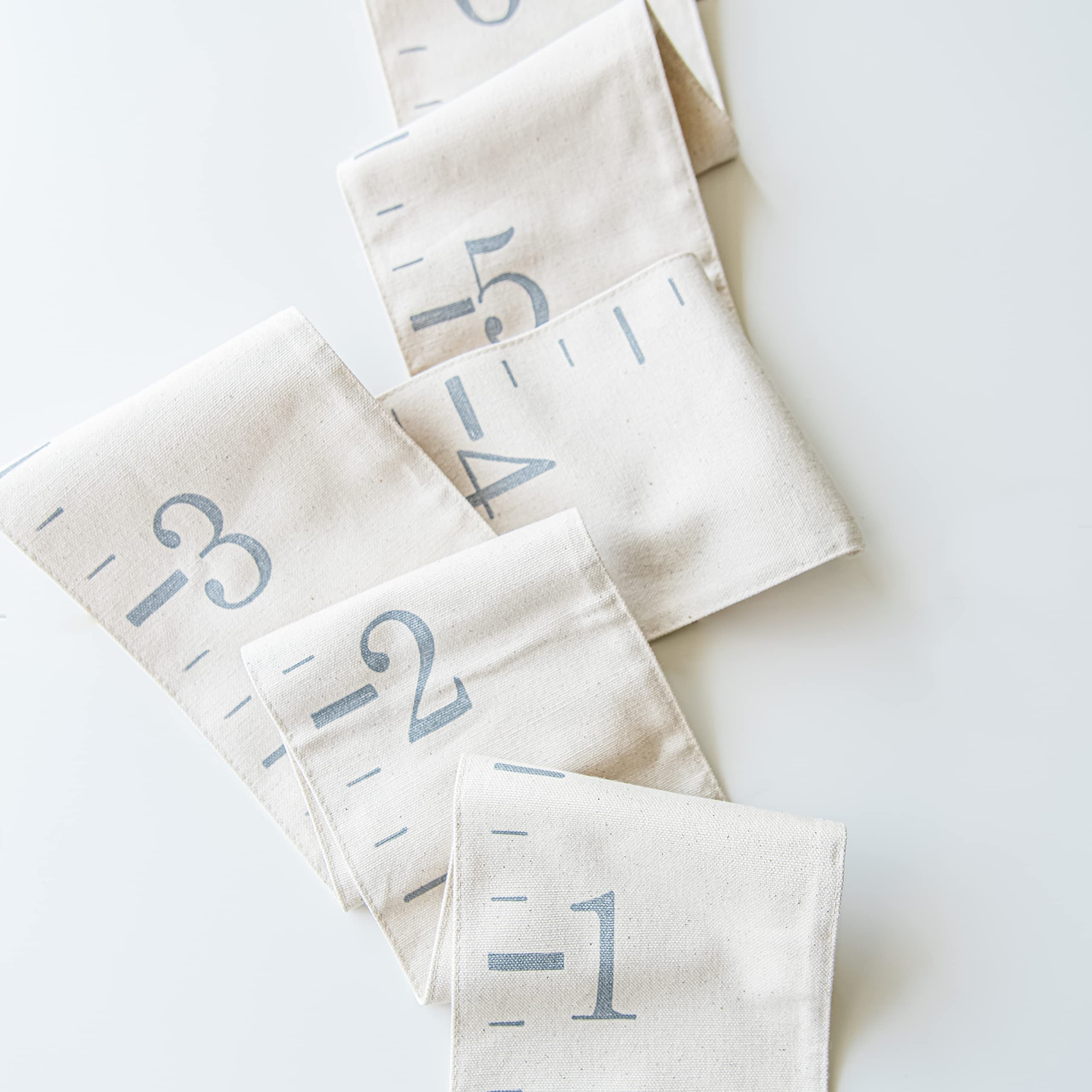 White Loft nursery wall decor with natural canvas ties into cozy bedrooms and play spaces