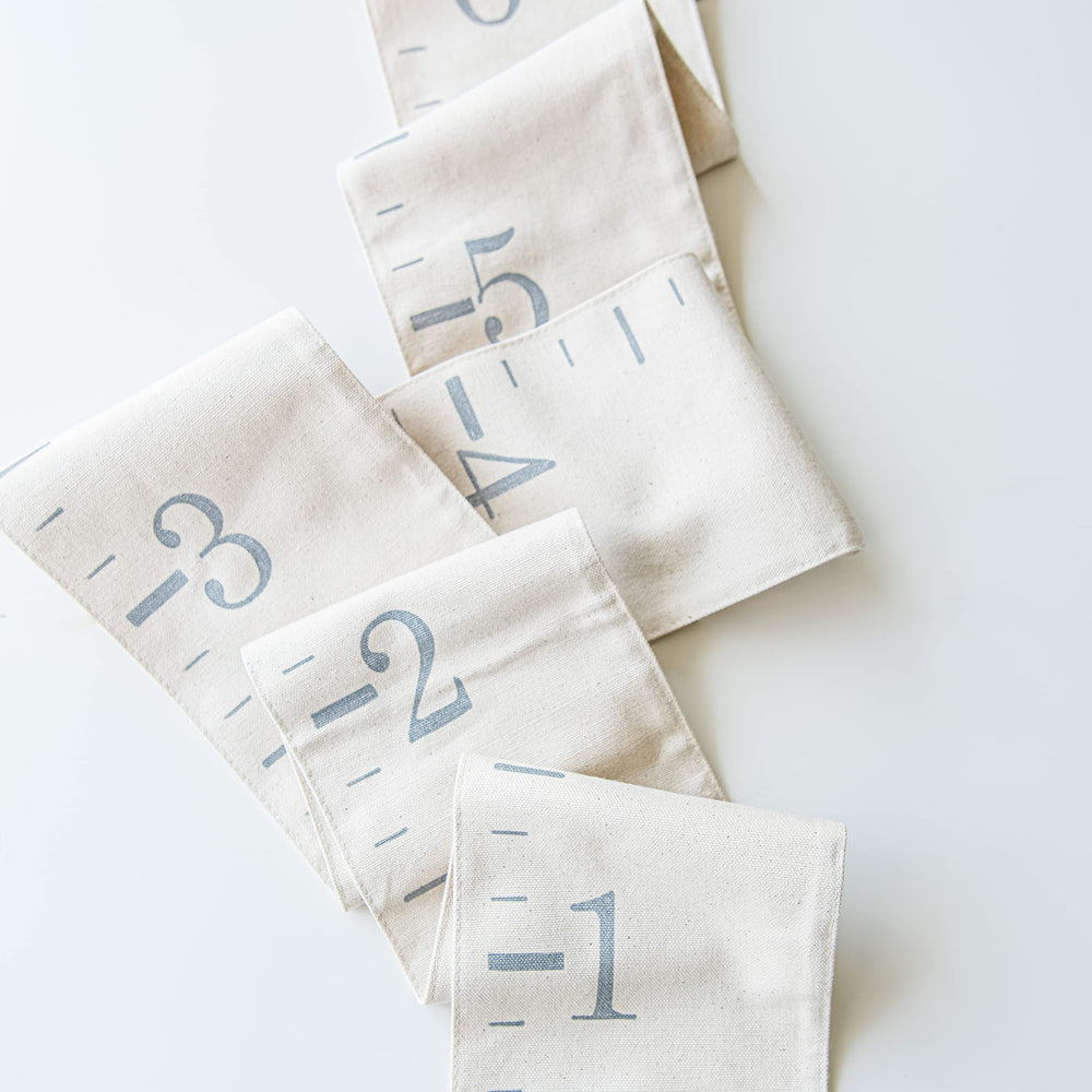 White Loft nursery wall decor with natural canvas ties into cozy bedrooms and play spaces