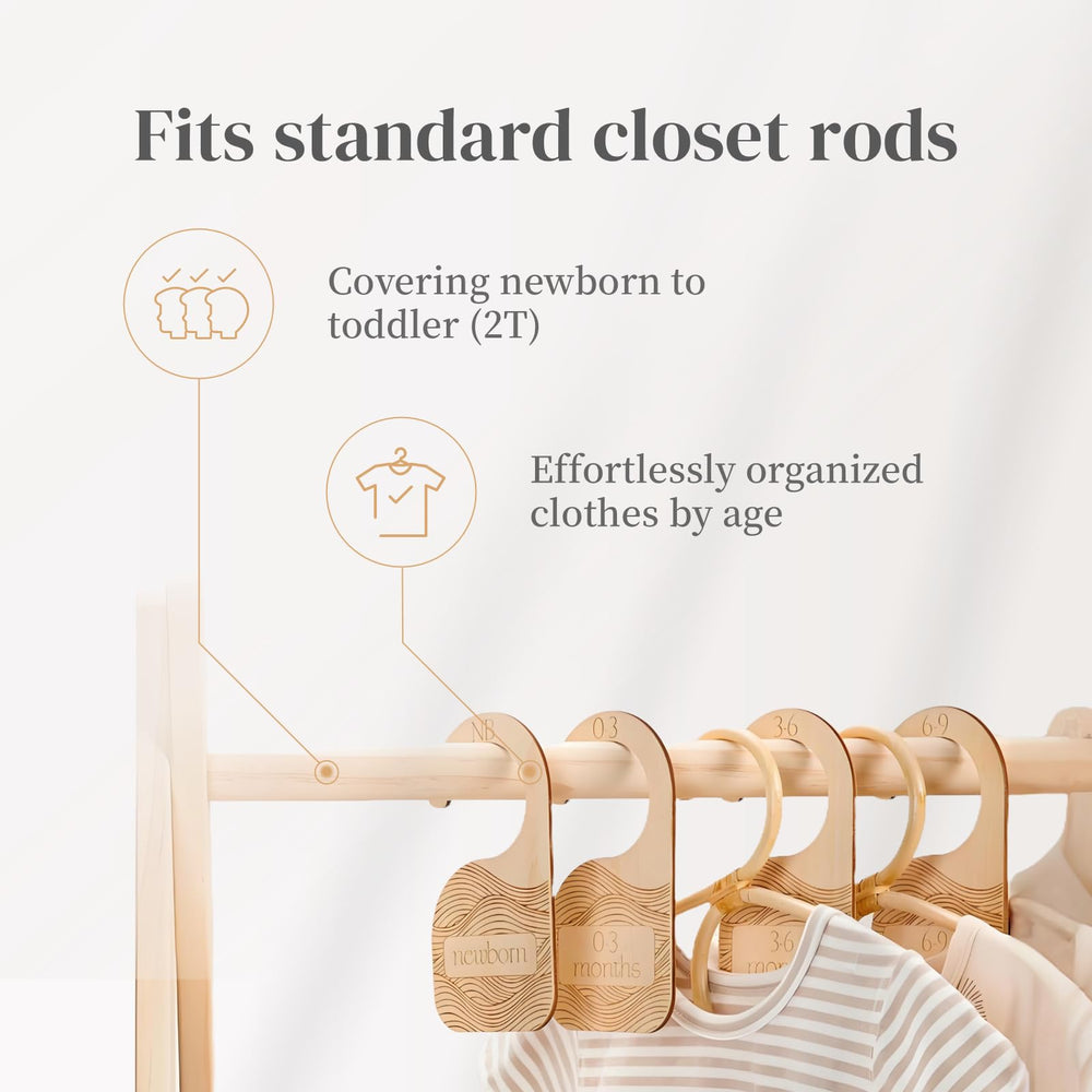 Whitluck's Baby Closet Dividers in closet help parents spot newborn-to-toddler sizes at a glance.