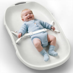 Widitn baby changing pad top view shows soft, wipe-clean surface for quick diaper changes.