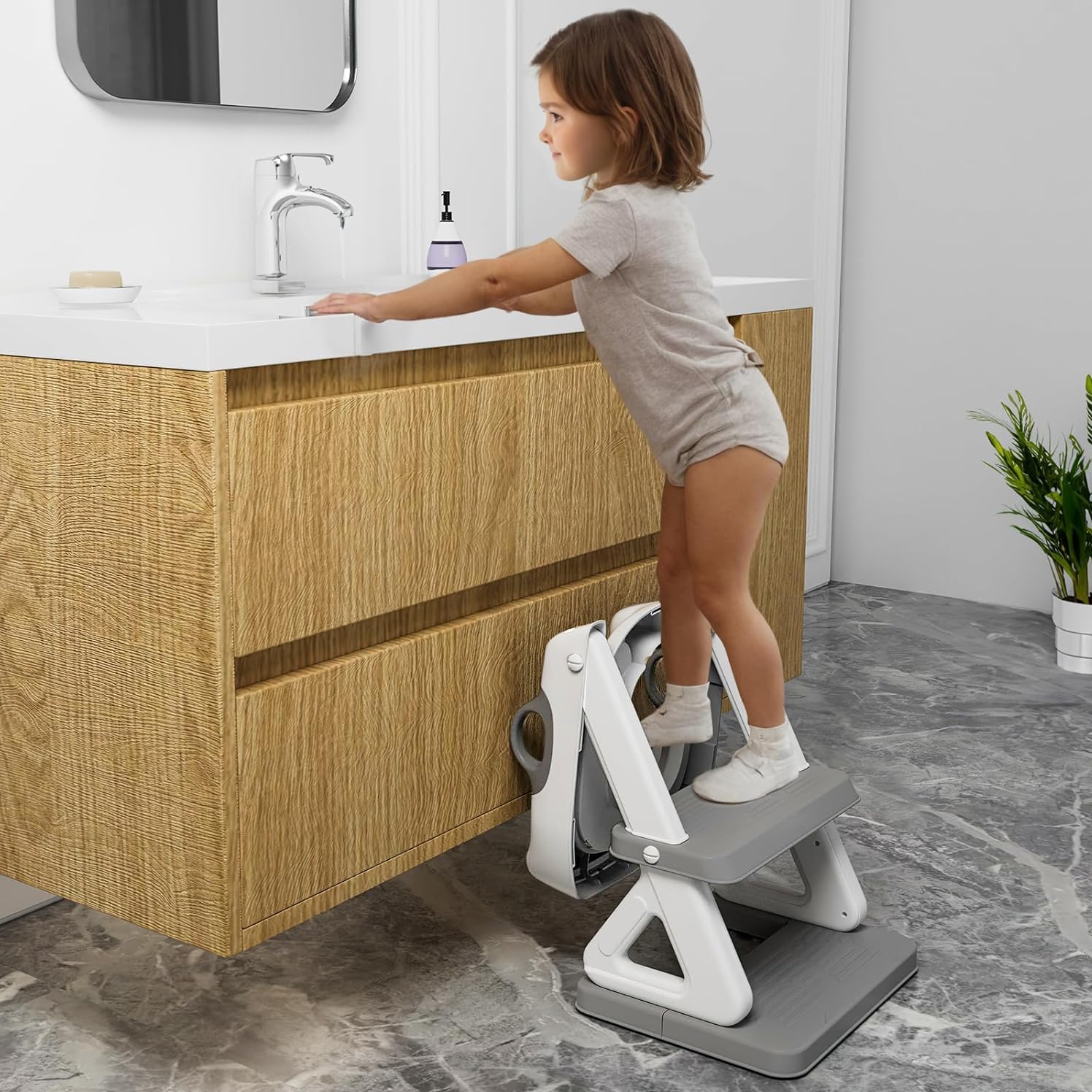 Wiifo potty ladder adjustable height range from 16.5 to 20 inches.