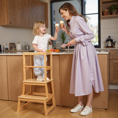 Wiifo toddler standing tower beside the counter boosts kid participation in cooking.