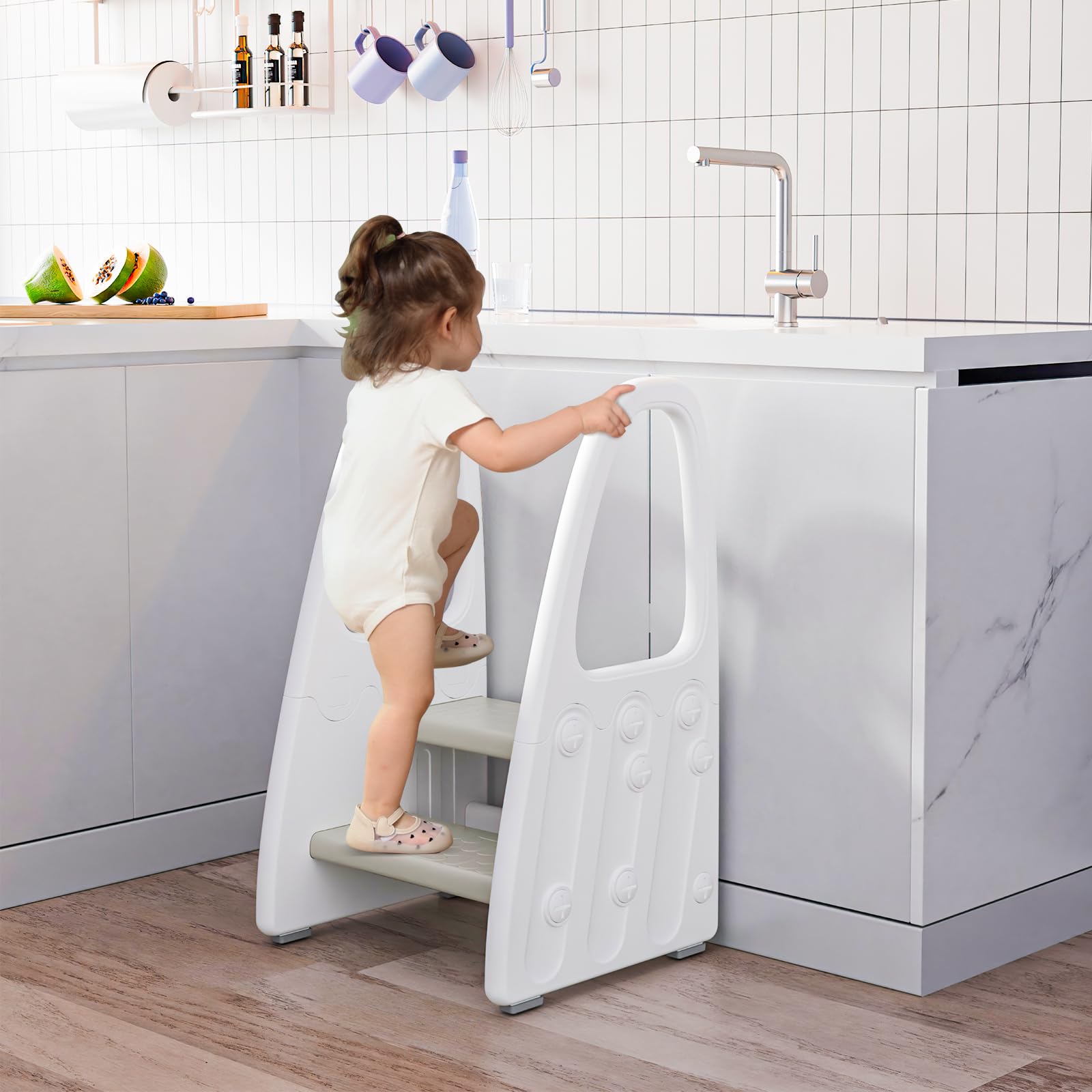 Wiifo two-step stool used for toilet training supports reaching the potty with confidence.