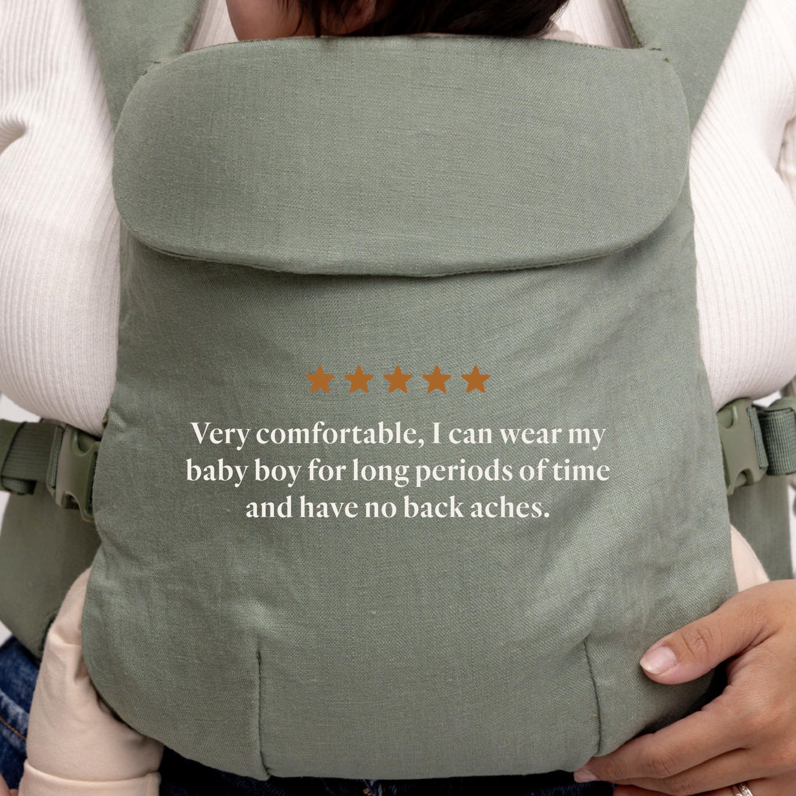 WildBird Aerial Buckle Carrier Acadian headrest adjusts for baby's alignment.