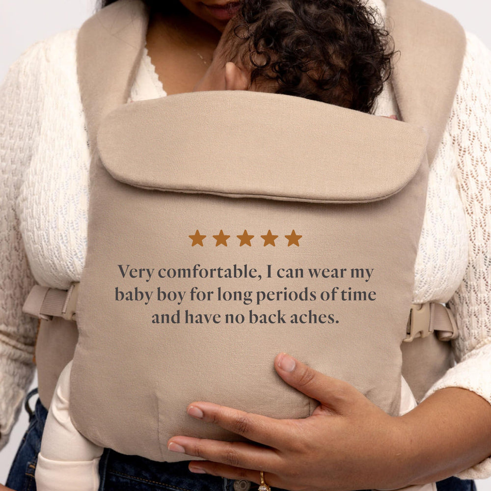 WildBird Aerial Buckle Carrier headrest keeps newborn comfort on the go.