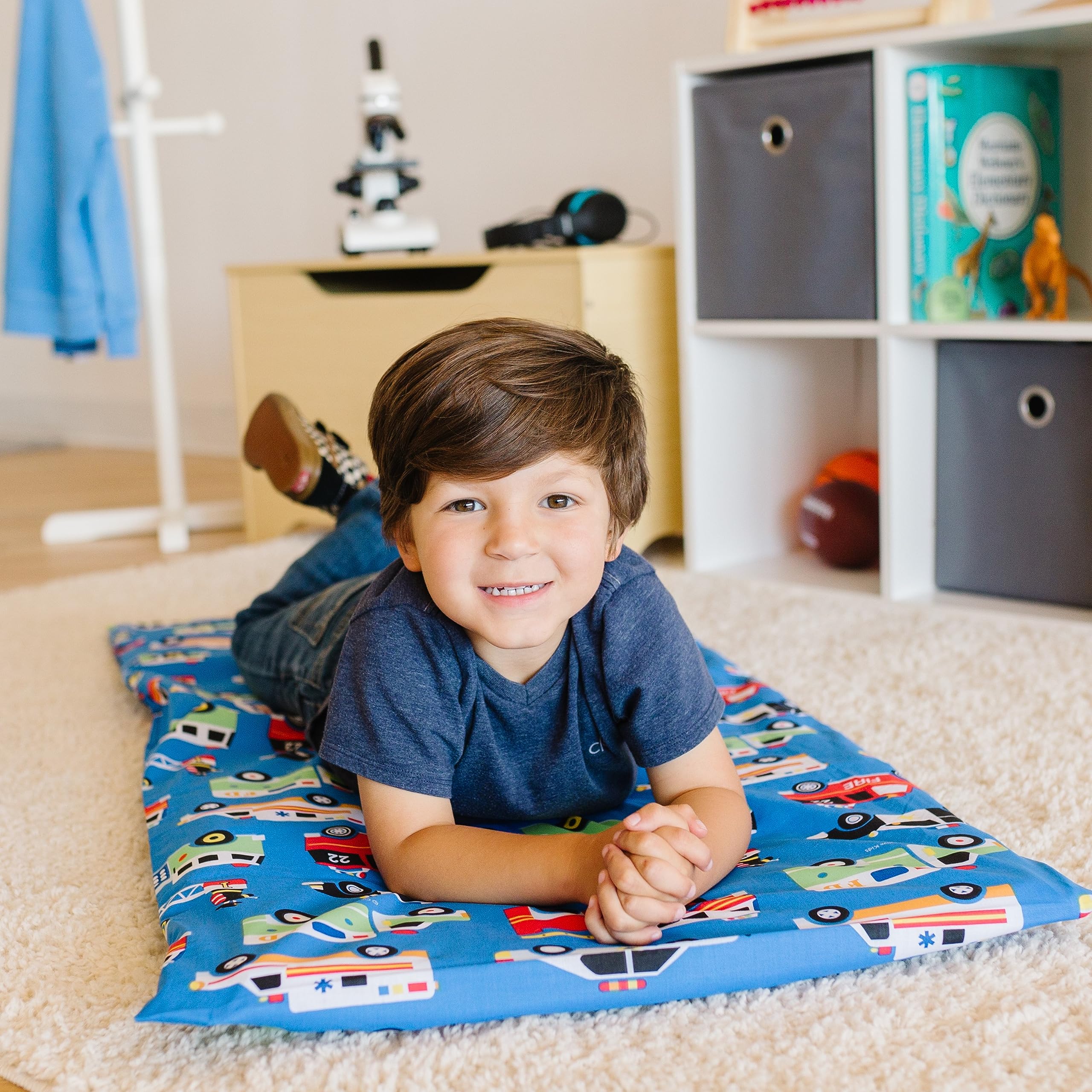 Wildkin Heroes nap mat cover folded closeup highlights strong stitching and durability