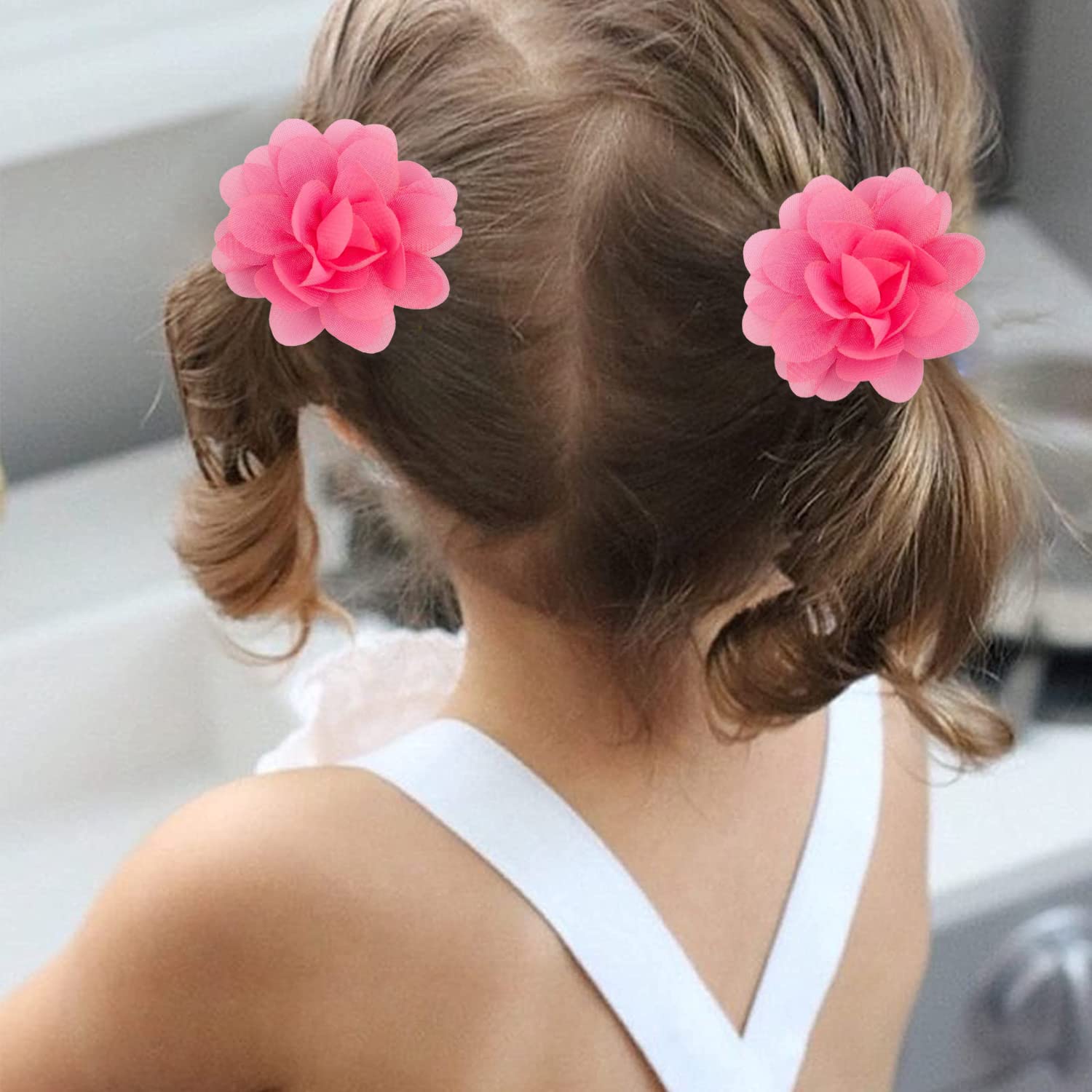 WillingTee baby girl outfit inspiration with flower bow clips.