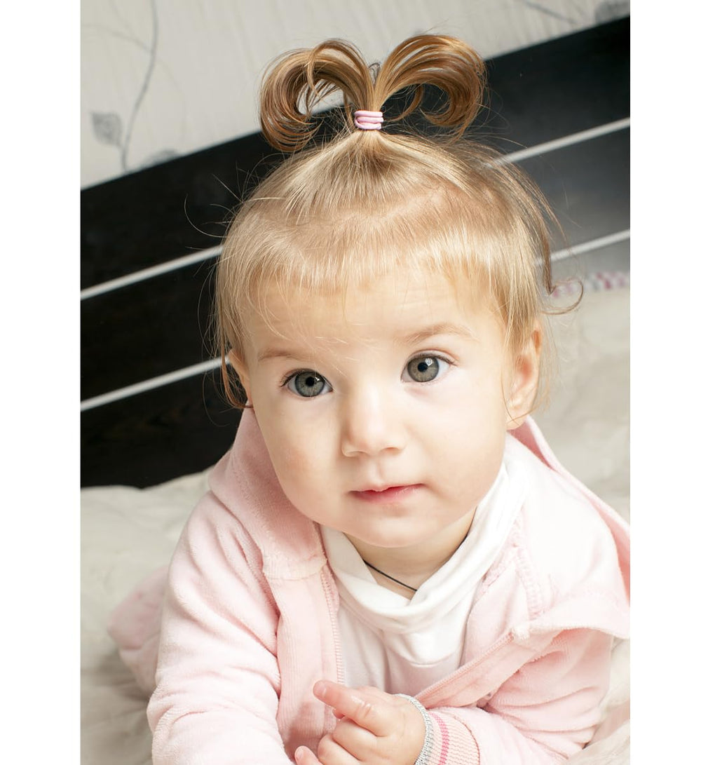 WillingTee baby girl ponytail ready for sports and playtime.