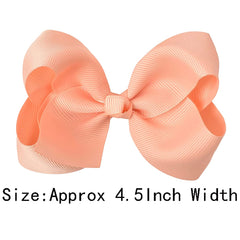 WillingTee hair bows on alligator clips showing durable grip