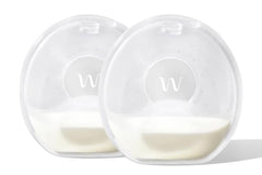 Willow Catch-All Milk Cups worn in bra to discreetly collect milk.