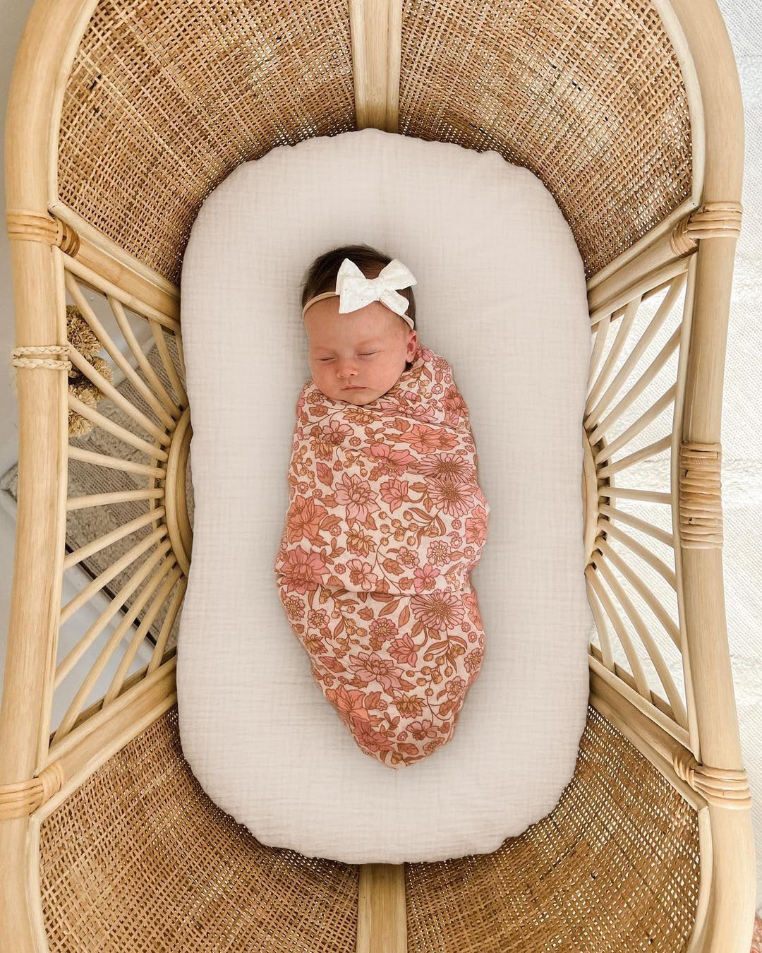 Wimist muslin baby lounger cover 2-pack stacked—convenient storage and quick swap