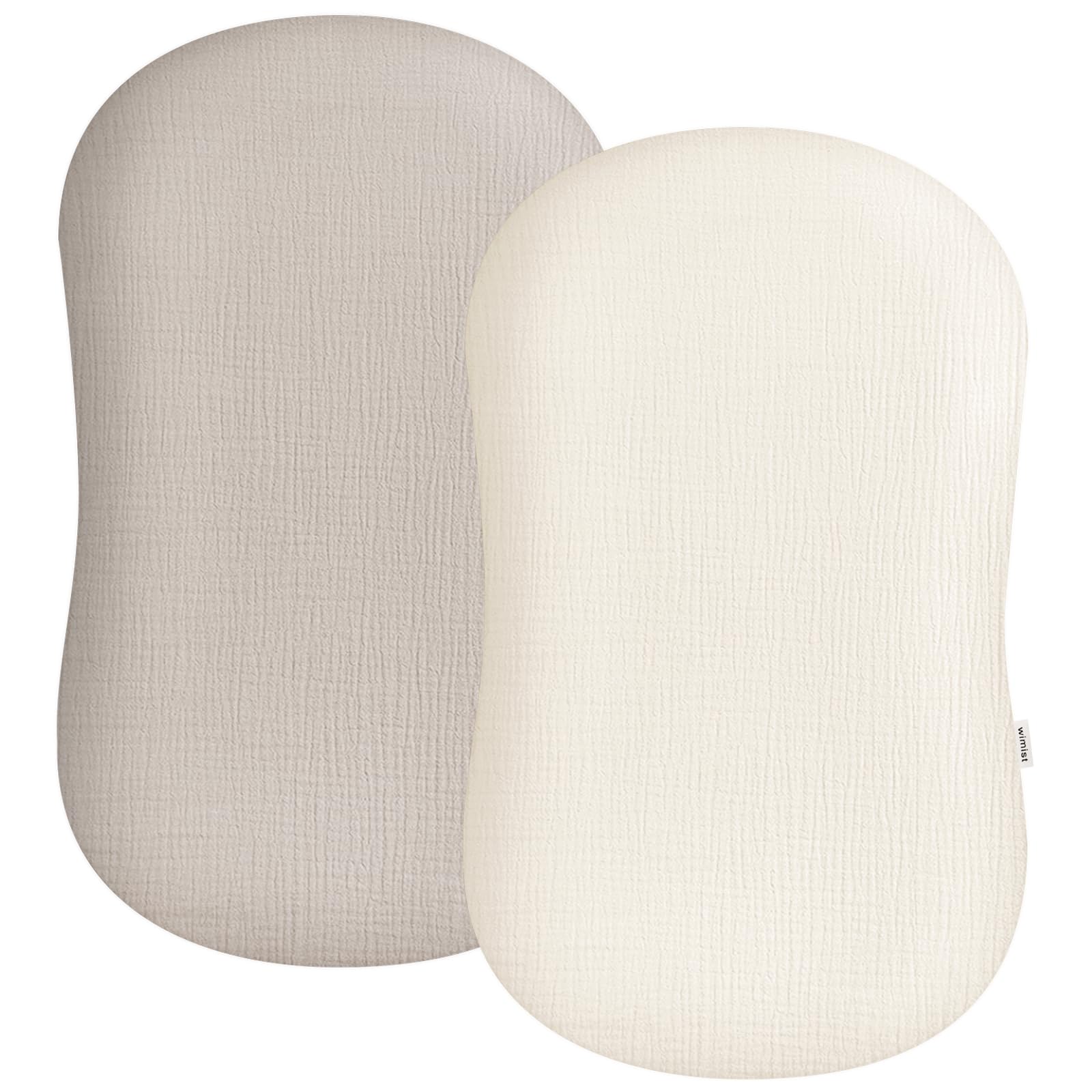 Wimist muslin baby lounger cover folded, showing soft fabric gentle on newborn skin.