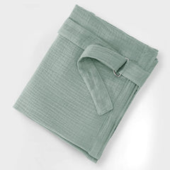 Wimist muslin nursing cover sage pocket open highlights convenient storage.