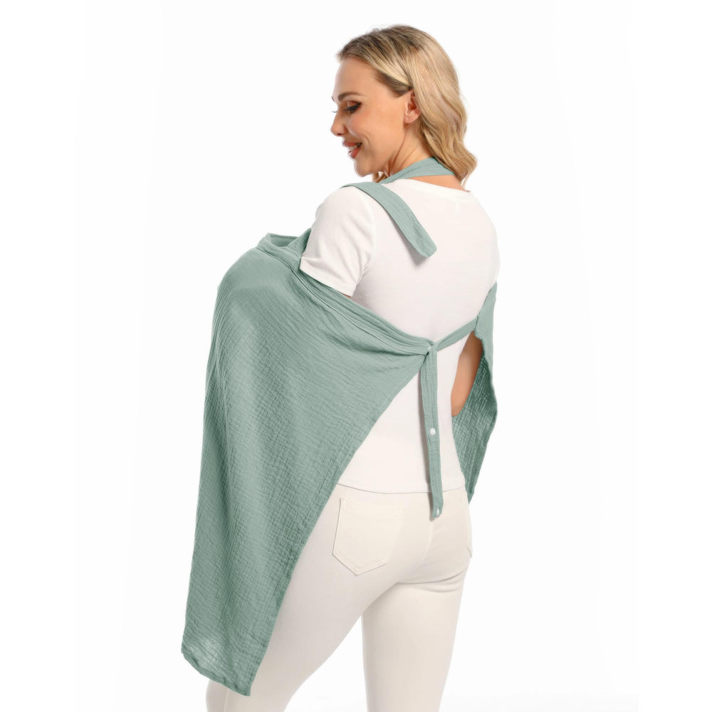 Wimist muslin nursing cover sage strap adjustment ensures secure, one-handed use.