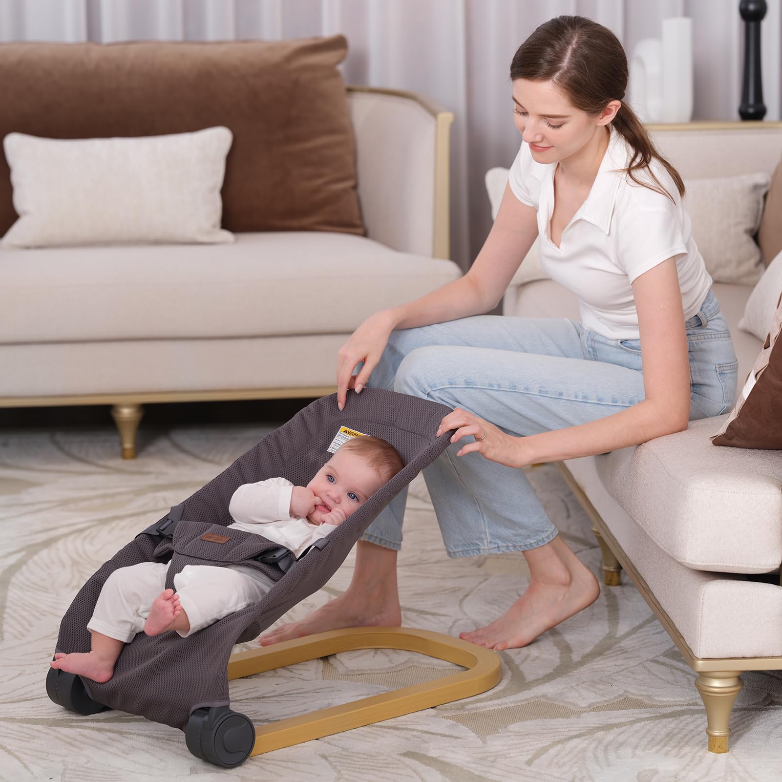 Winchild baby bouncer folded compact image shows easy storage and portability