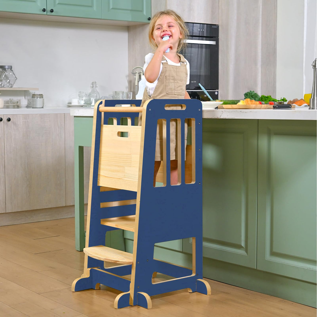 Wingyz Toddler Tower fully assembled beside kitchen counter for safe participation.