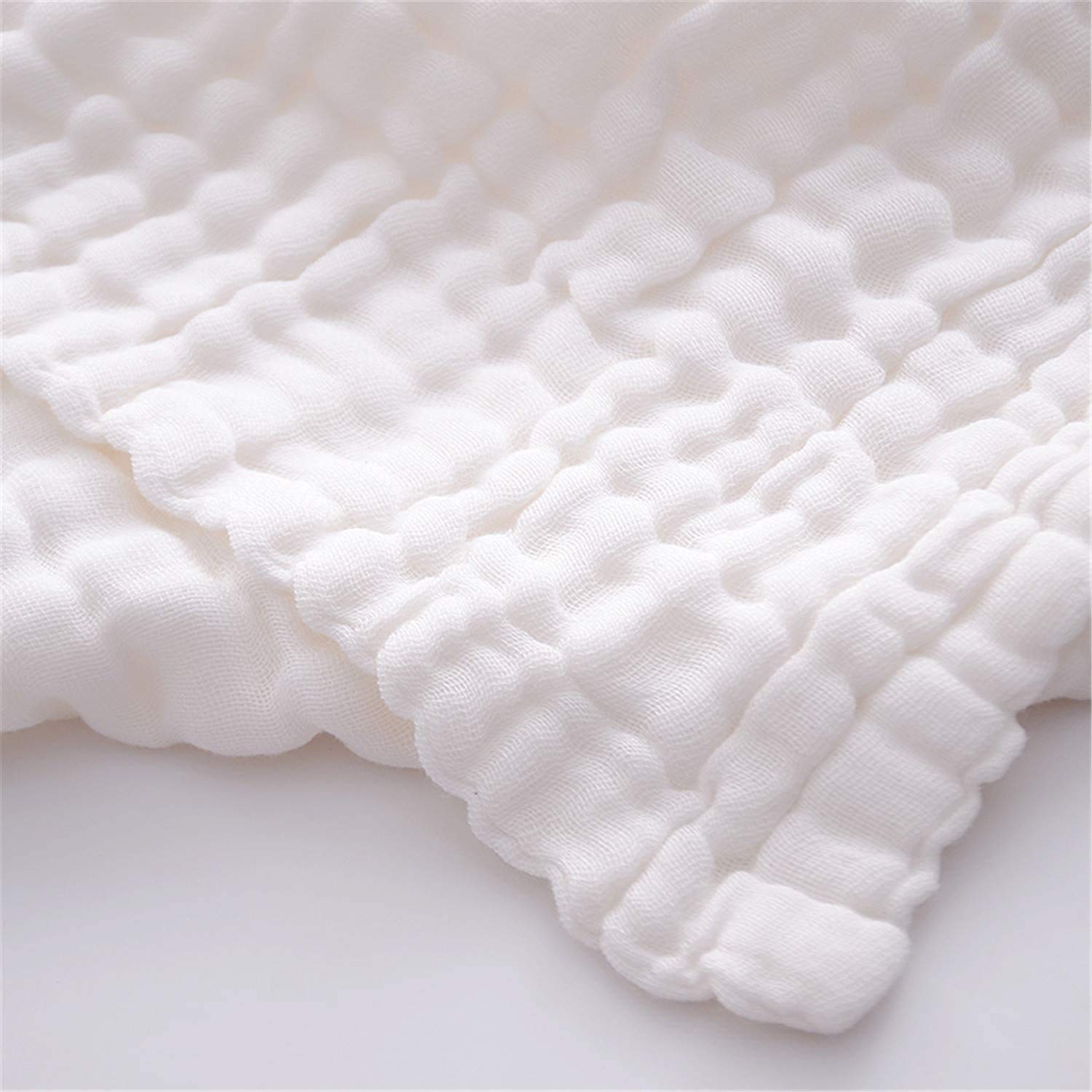 WinReal muslin baby towels multipurpose usage image suggests swaddle, cover, and drying flexibility.