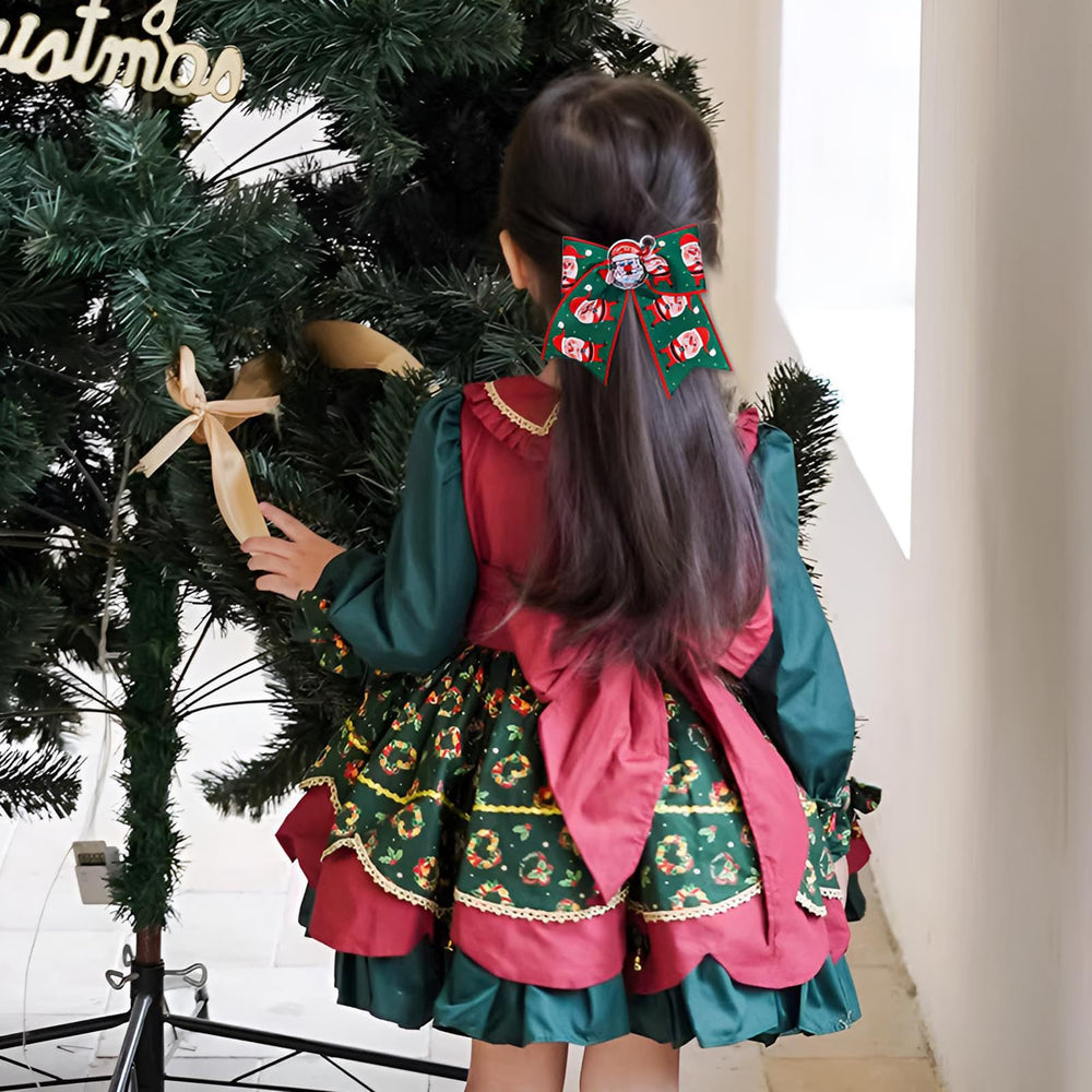 Winthrop Christmas hair clip bells bow complements holiday outfits.