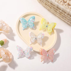 Wistamik butterfly hair clip texture detail showing embroidery and sequins.