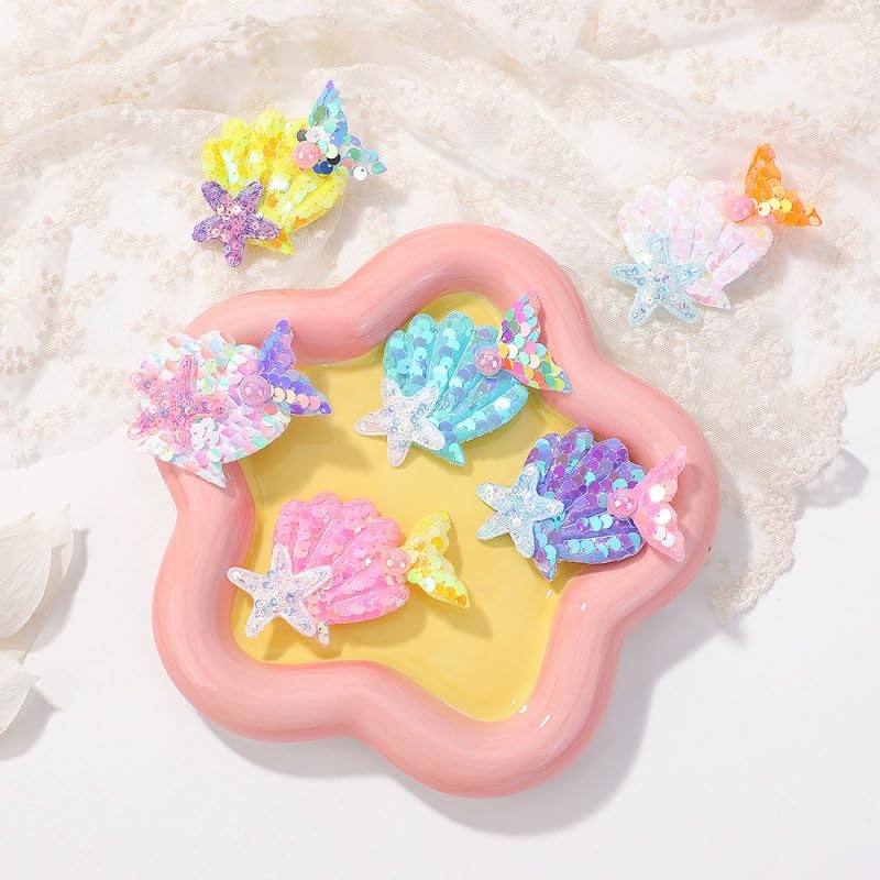 Wistamik mermaid hair clip in coral—sparkle detail enhances party-ready looks.