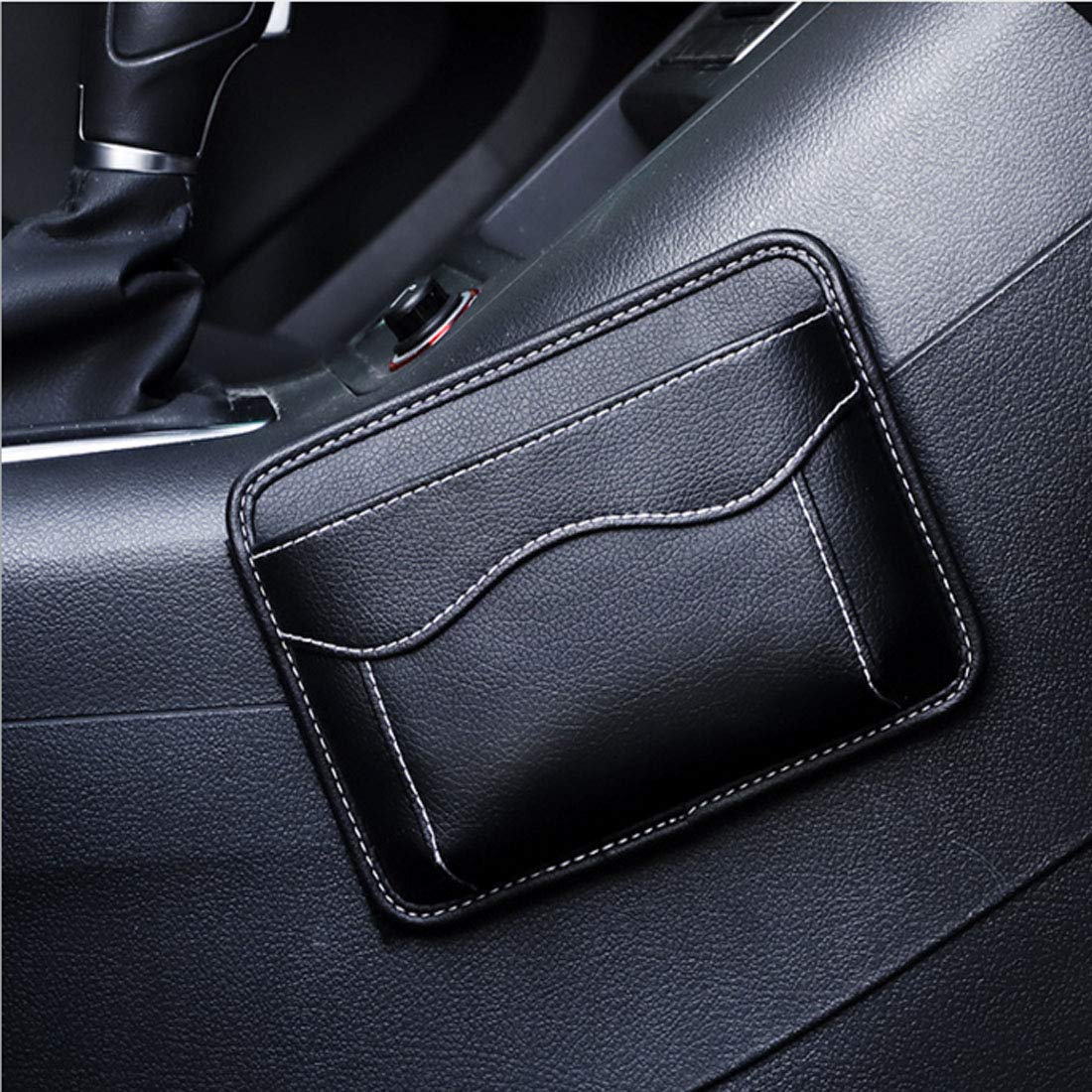 Wittocs interior storage leather pocket neatly contains documents and notepads for quick access
