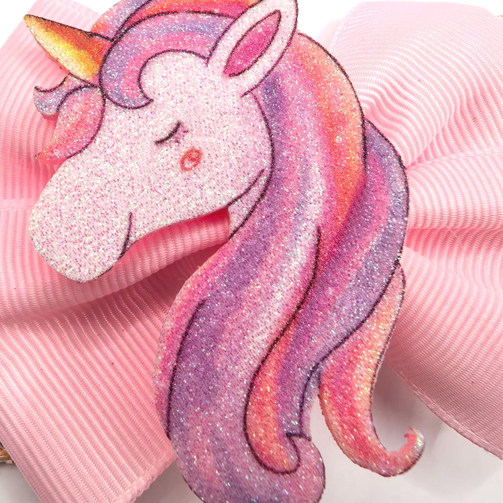 WIWUFUE pink unicorn hair bow shows vibrant fade-resistant color.