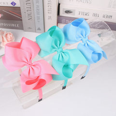 WJYX BOWS elastic hairbands fit toddlers to adults for easy styling