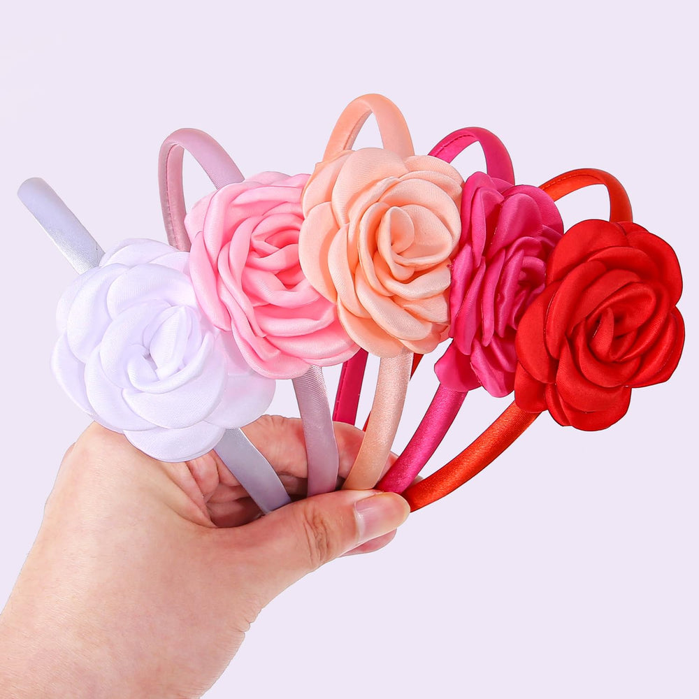 WJYX BOWS elastic one-size-fits-most headband on child