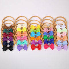 Soft elastic bands of WJYX BOWS ensure comfy all-day wear for babies.