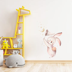 Wland moon stars nursery decal enhances bedtime ambiance with whimsical celestial detail.