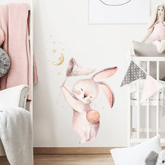 Wland watercolor rabbit wall sticker adds soft, comforting imagery to reading nooks.