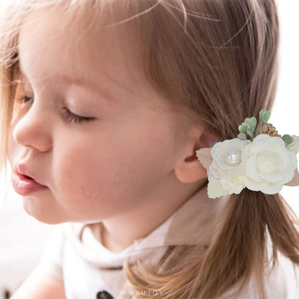 WNYUJOY flower hair clip on toddler hair demonstrating easy one-hand snap