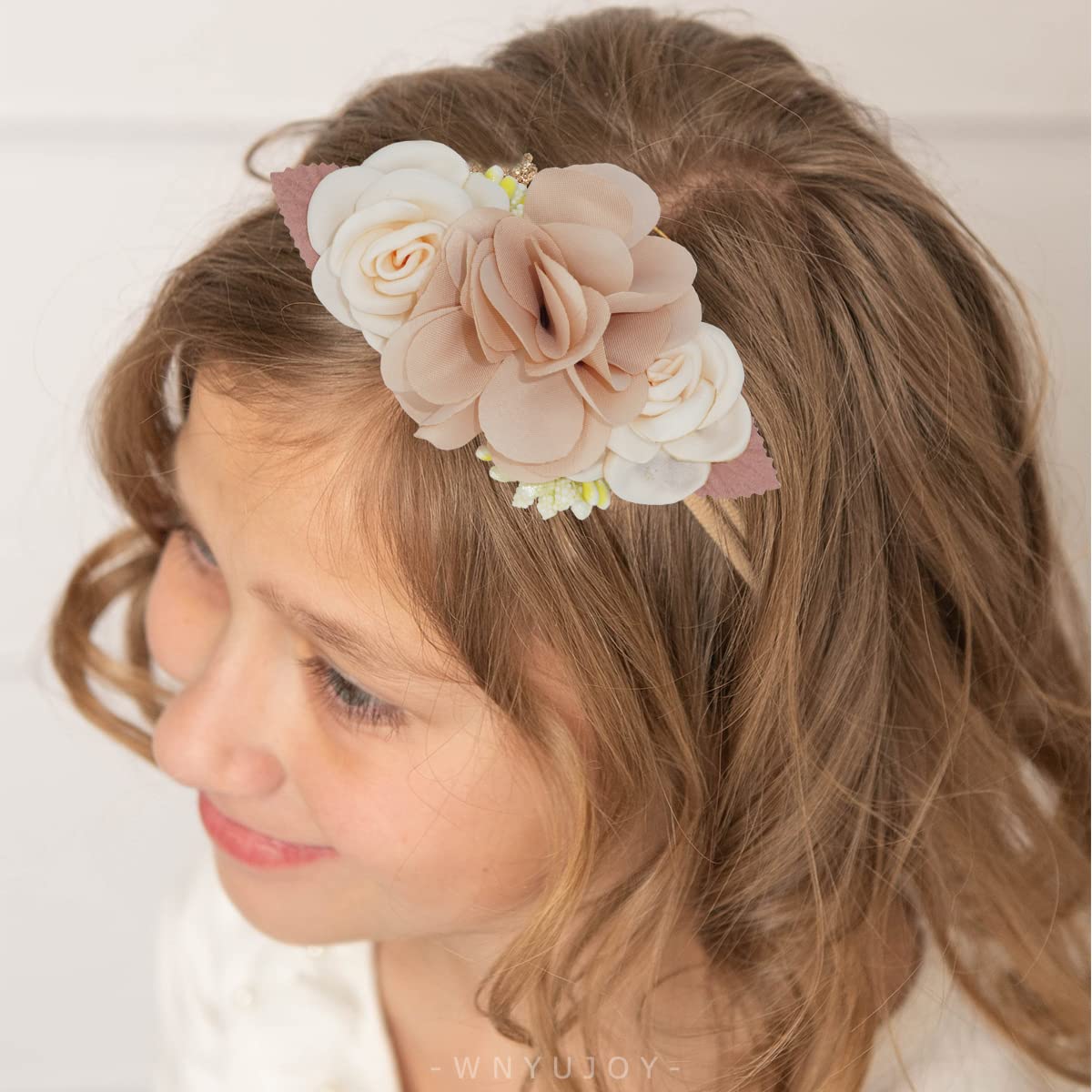 WNYUJOY gift-box packaging for flower headbands, pink box includes multiple colors.