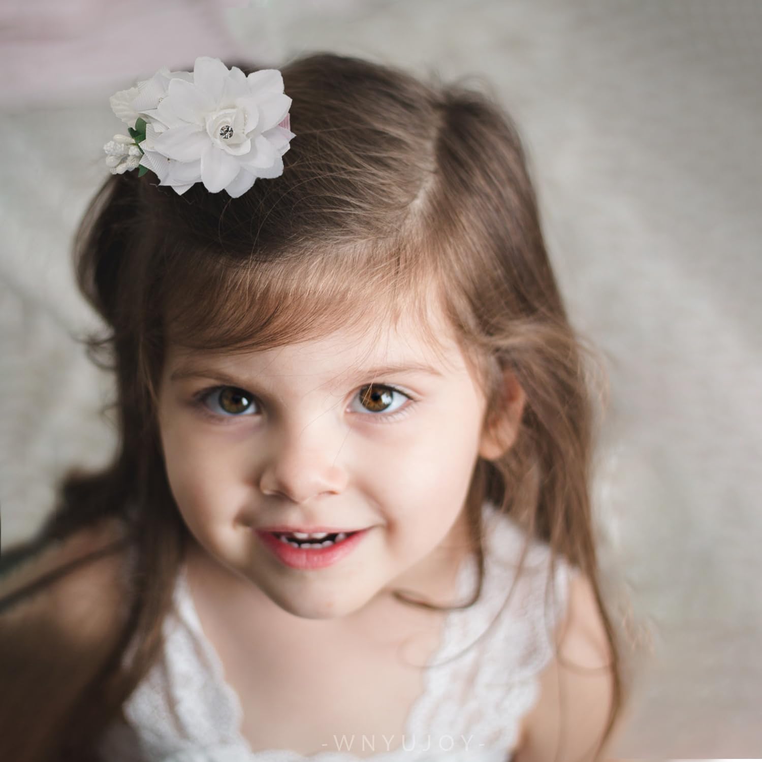 WNYUJOY handmade fabric flower detail adds soft texture and charm.