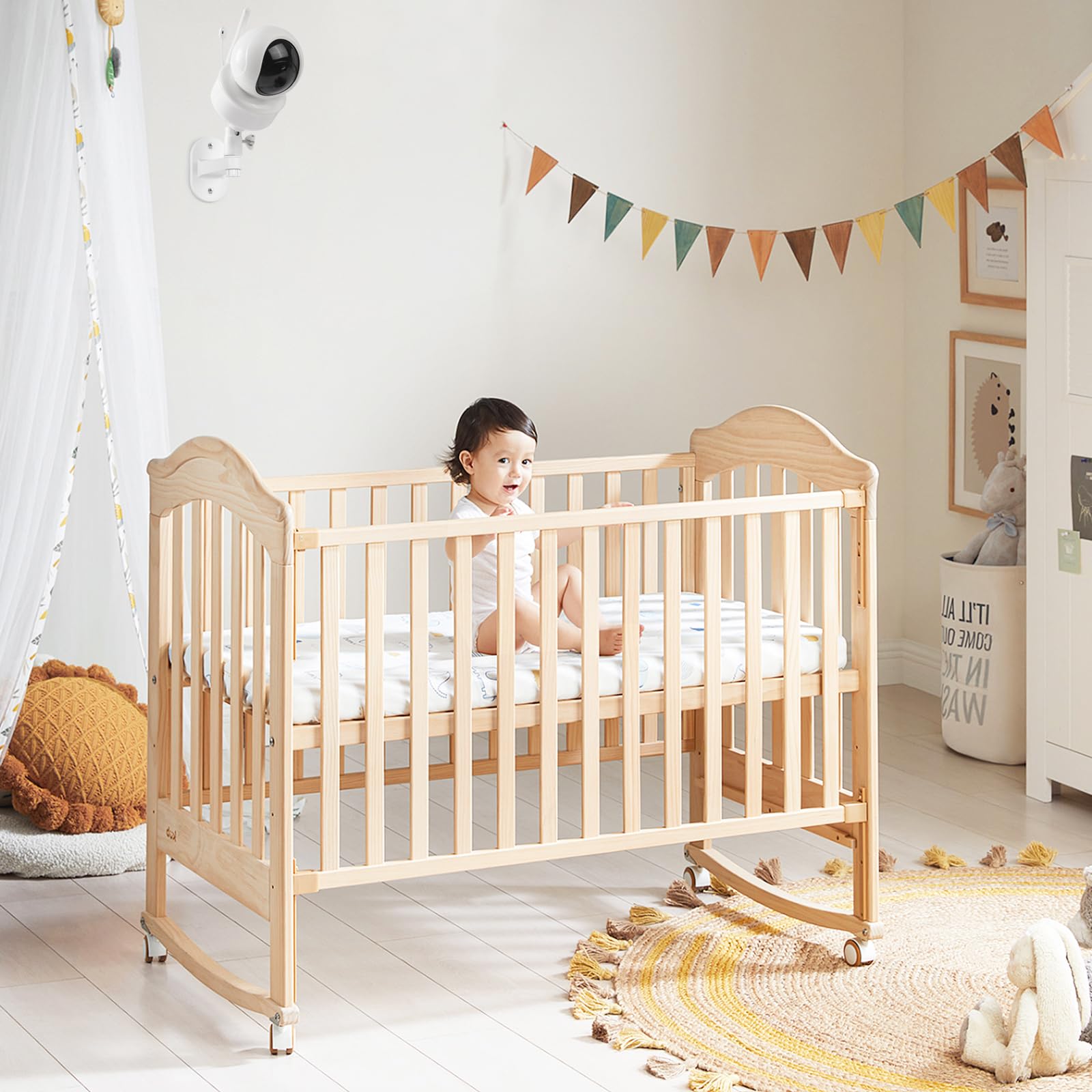 Wochel baby monitor mount positioned high on wall for safer, away-from-baby reach viewing.