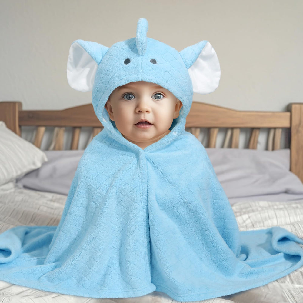 WODHOY toddler wrapped in towel, warm after bath.