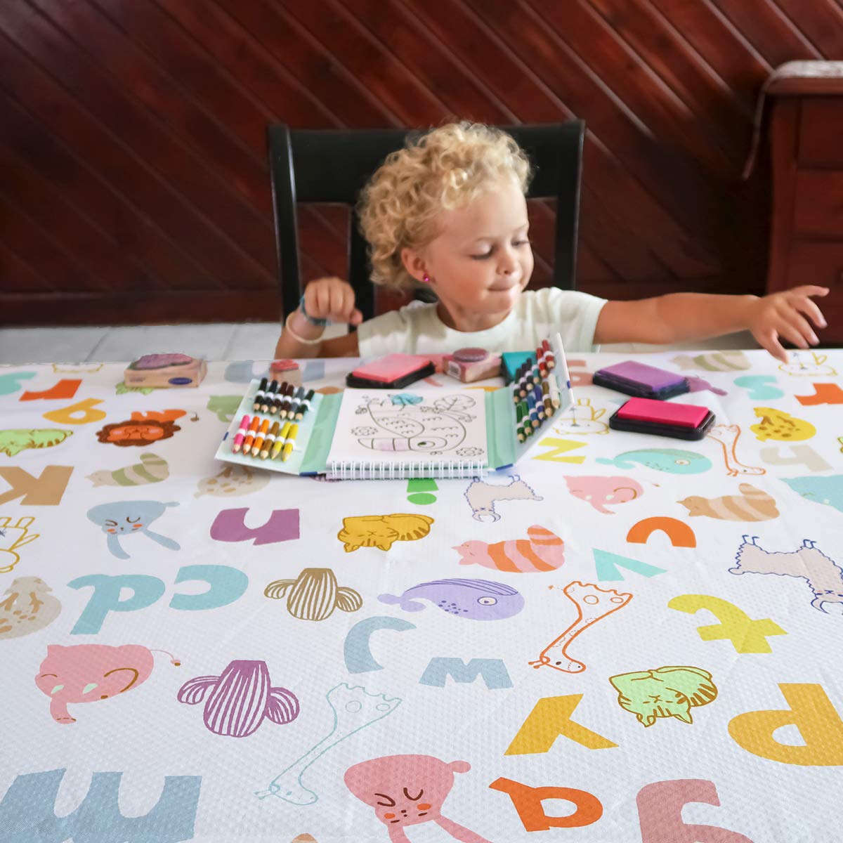 WOMUMON high-chair floor protector guards hardwood floors during feeding.