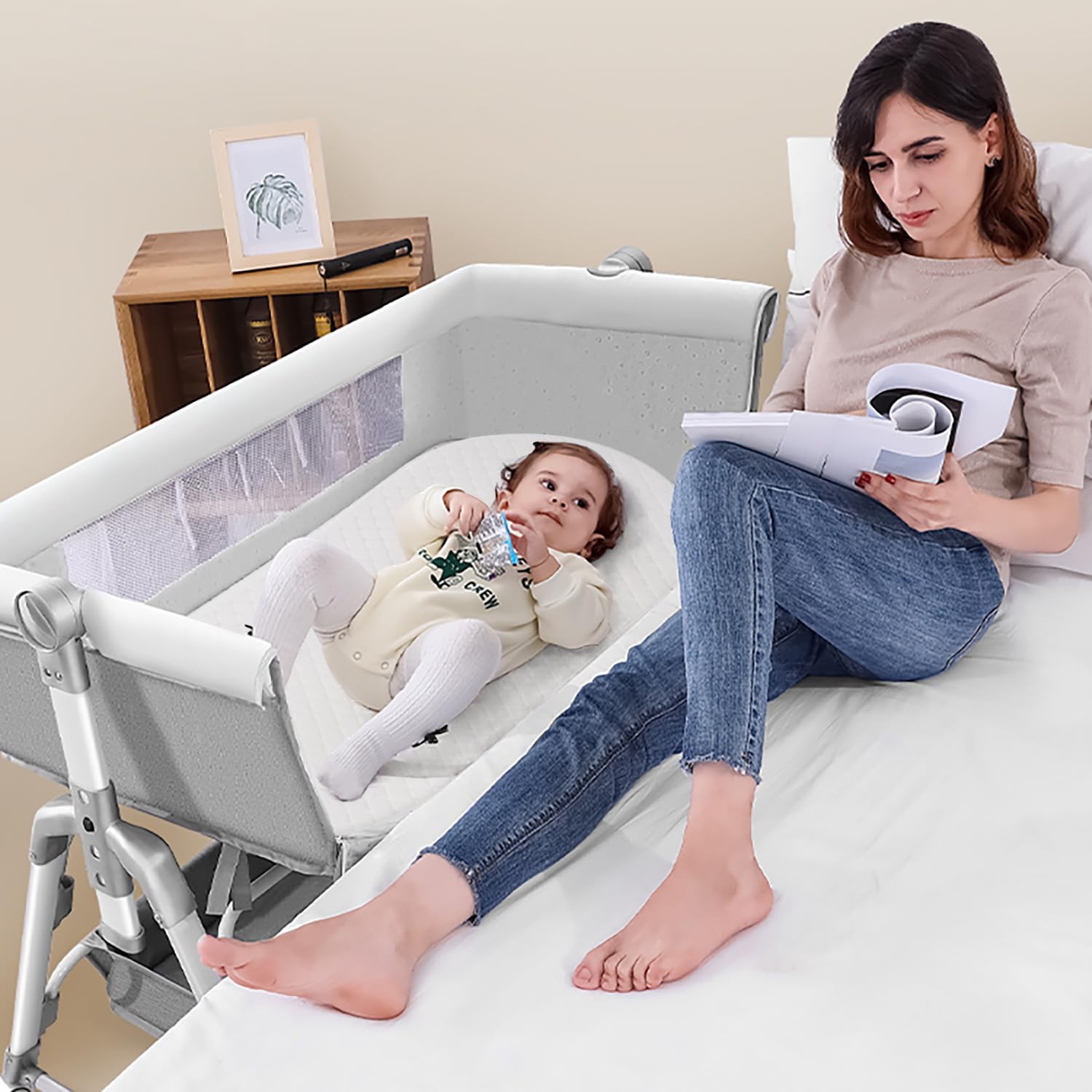 Wonder Living baby bassinet mattress unboxed showing compact, space-saving design.